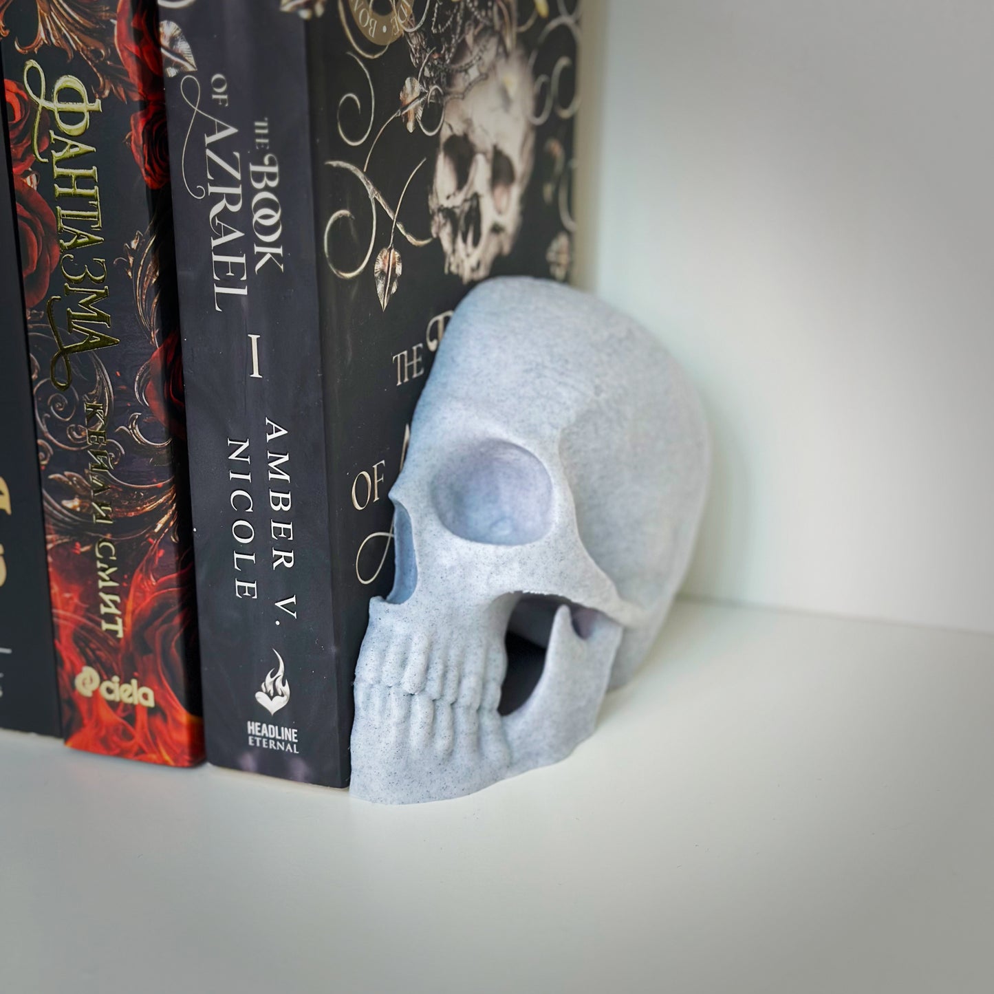 Черепи подпори за книги