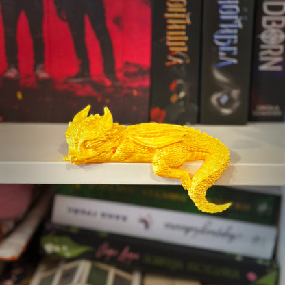 Спящо бебе дракон