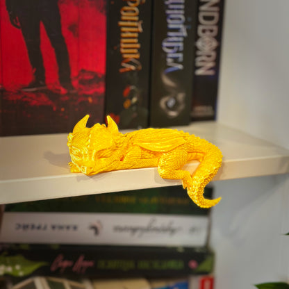 Спящо бебе дракон